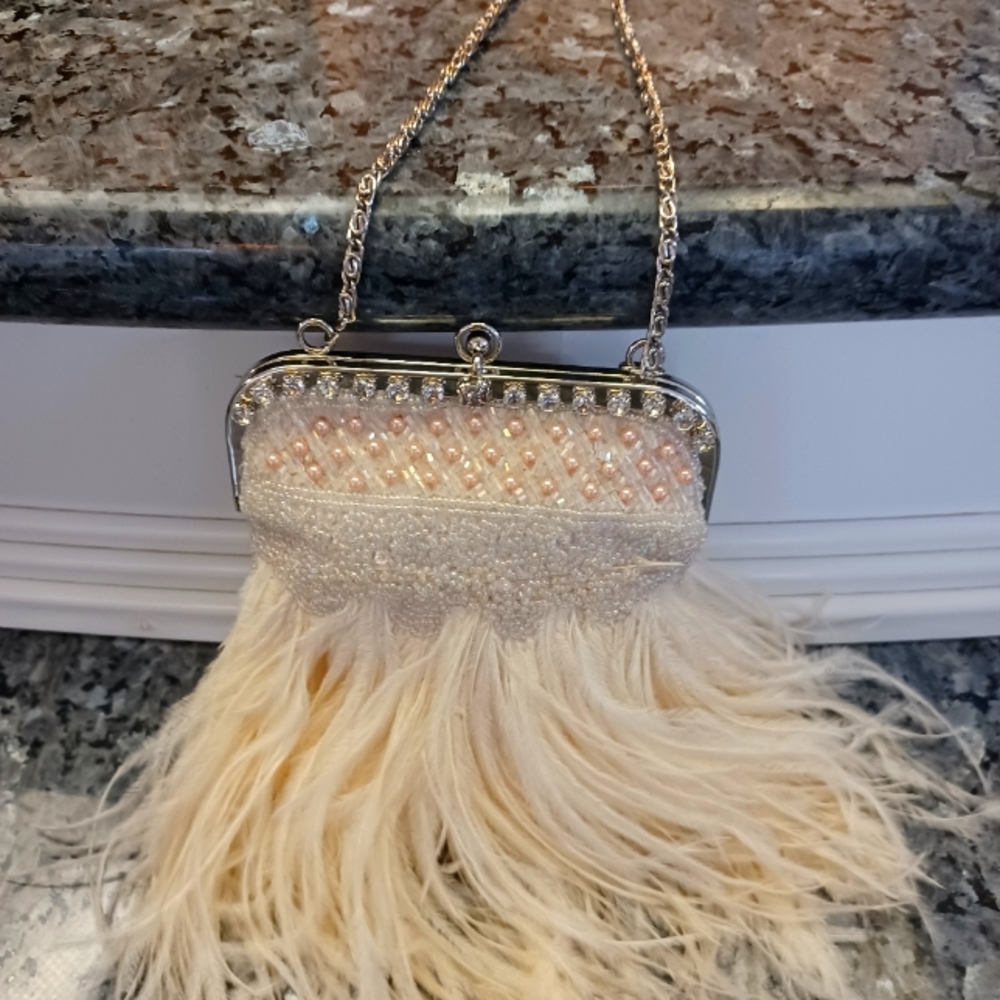 E. Ferri Glamure Beige Feather/pearl evening bag.